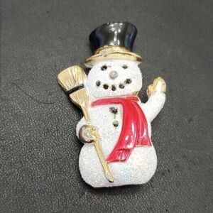Vintage gold tone white glittery snowman brooch